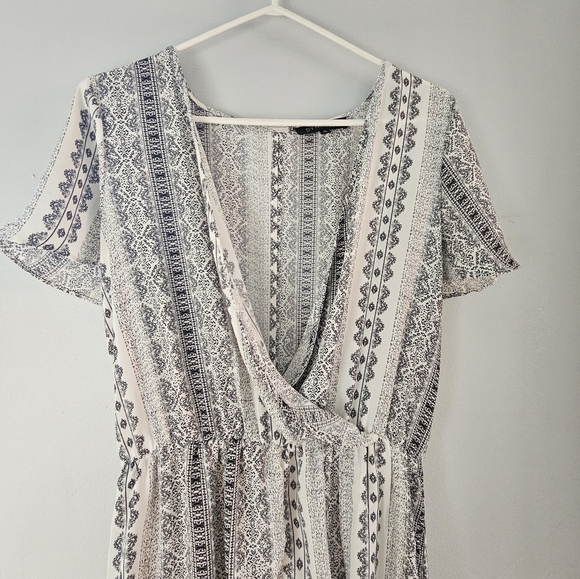 Dynamite Patterned Romper - Picture 1 of 7